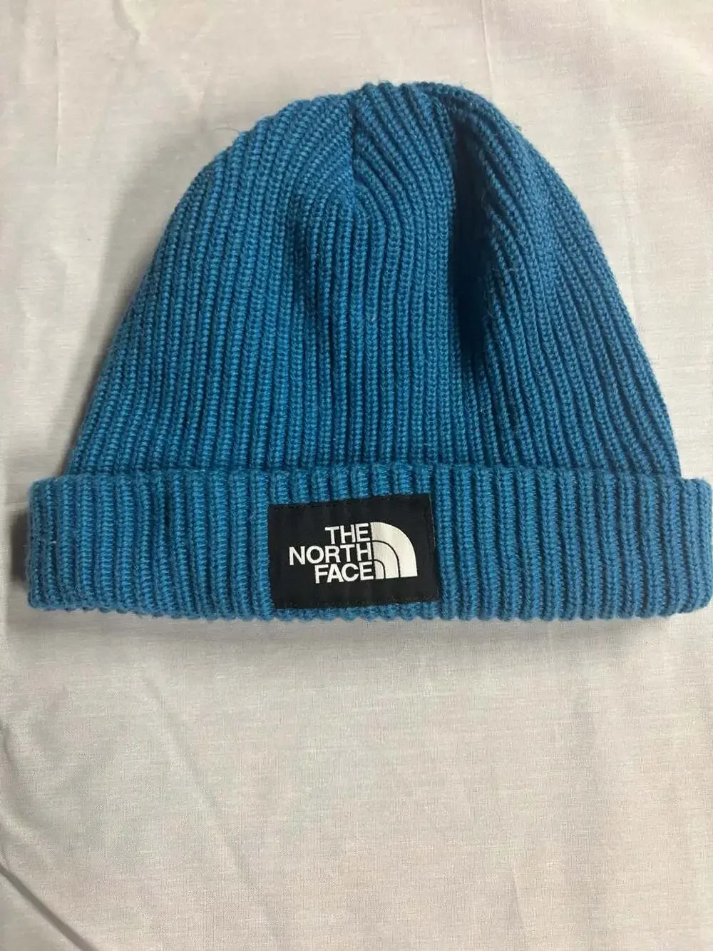 The North Face Logo Box Cuffed Beanie in Blue